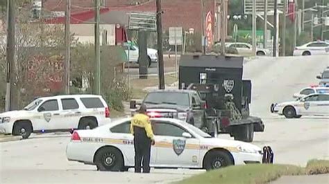 robbery suspect surrenders after 11 hostages taken at florida bank