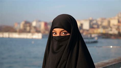 Woman Dressed With Black Headscarf Chador On Istanbul