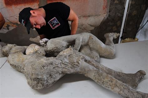 restoration reveals the embracing two maidens of pompeii