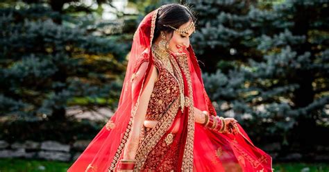 why do indian brides wear red