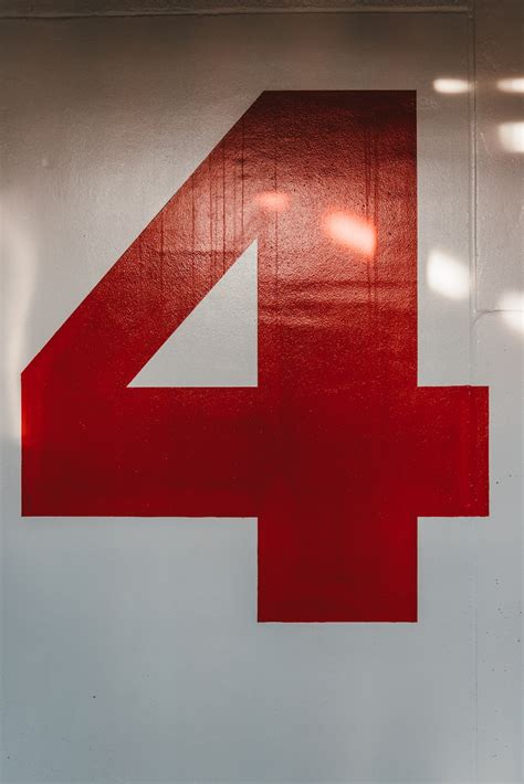 red number  sign photo  logo image  unsplash