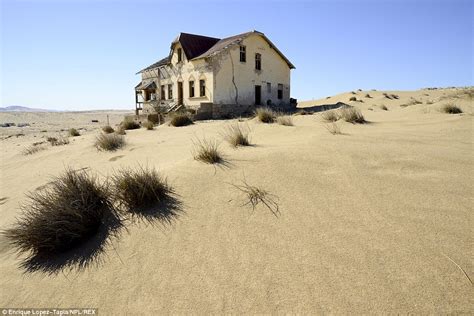 images reveal abandoned wooden houses in namibian desert ghost town