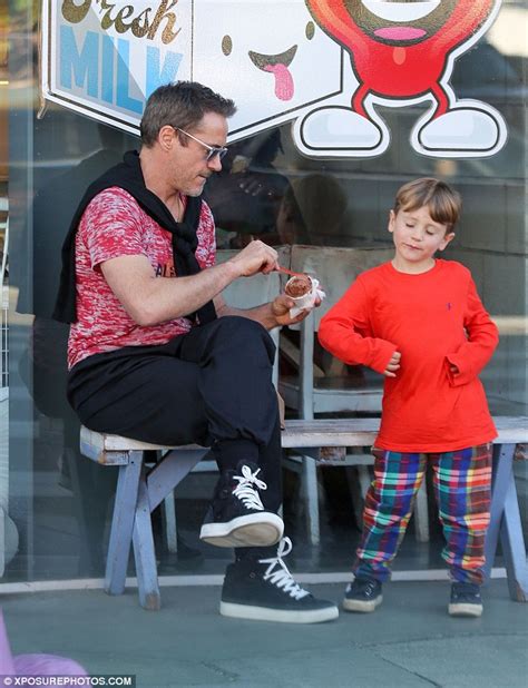 robert downey jr plays doting dad as he feeds his son ice cream daily mail online