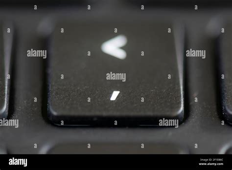 comma  angle bracket key   laptop keyboard stock photo alamy