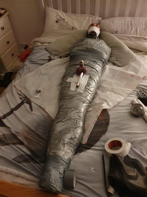 mmmm beautiful tight taped  mummy   today completely trapped xd