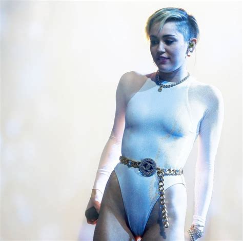 miley cyrus lets her crotch hang out as she smokes cannabis joint on stage at mtv europe music