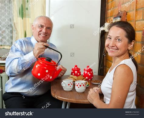 Happy Mature Couple Having Morning Coffee Indoor Stock