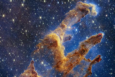 jwst turns  camera   eagle nebulas famous pillars  creation