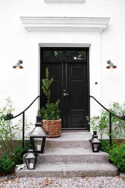 black double doors cottage home exterior
