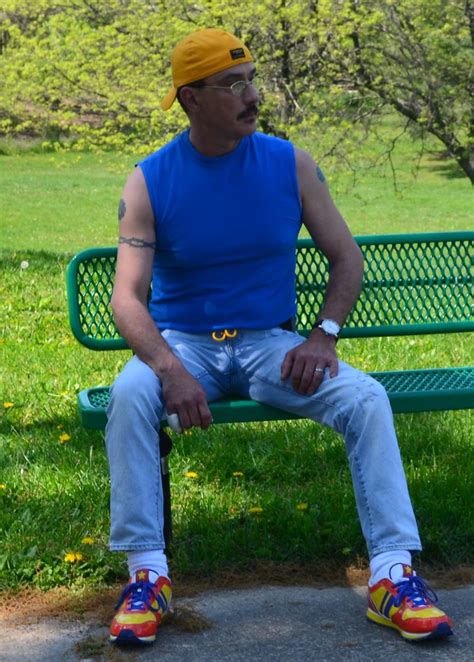 gay guy cruising park in keds jeans white socks a photo