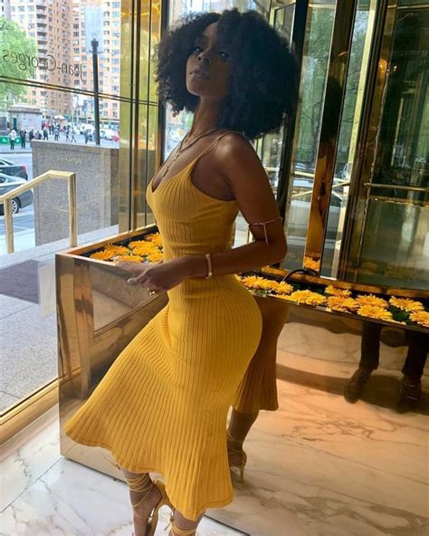 black woman    yellow dress styled