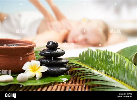 spa massage  tropical palm beautiful young woman  spa