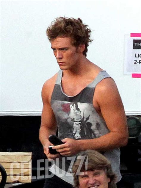 sam claflin gets shirtless on the hunger games catching