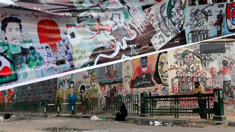 uprising graffiti wall near egypt s tahrir square torn