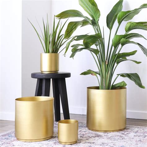 23 Affordable Indoor Planters We Love Metal Planters Planters
