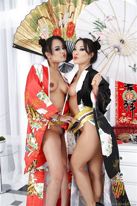 sexy asian milfs annie cruz and asa akira posing with toys in their assholes