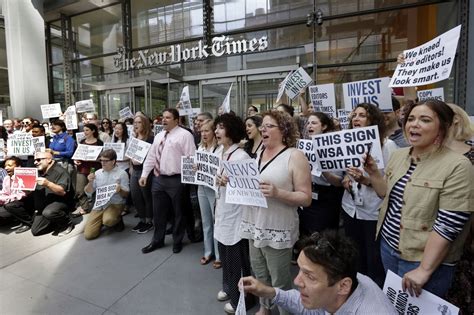 why hundreds of new york times employees staged a walkout in support of