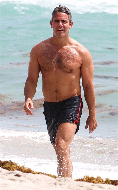 andy cohen shows off impressively buff biceps and abs in hot gym pic