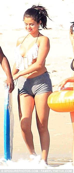 Selena Gomez Shows Off Her New Curves In Skimpy Frilled Bikini Top