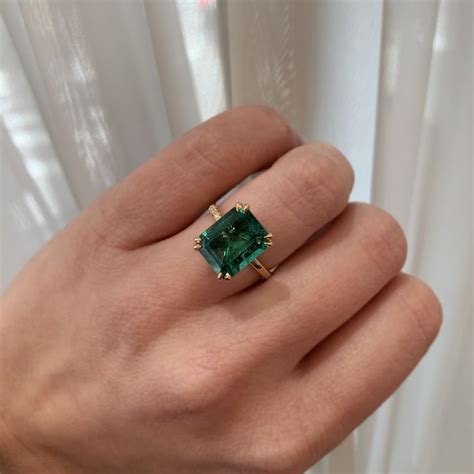 carat green emerald bespoke marisa perry engagement ring engagement rings green