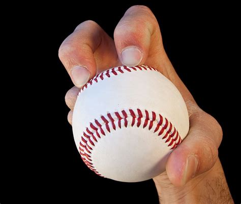 photo shows   knuckleball pitcher holds  ball  knuckleball   pitch  spins