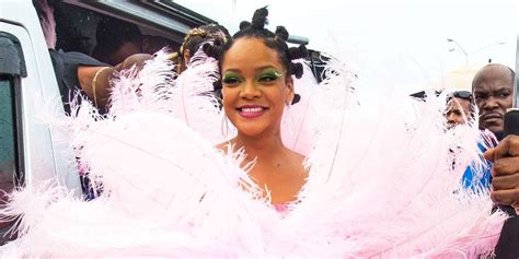 rihanna wears giant pink feathered dress for crop over