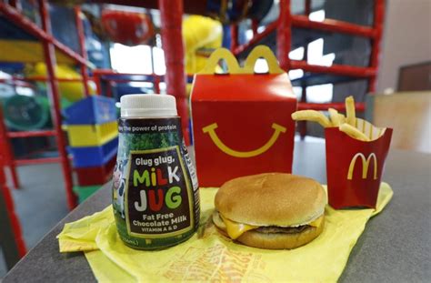 mcdonald s dropping cheeseburgers chocolate milk from its happy meal