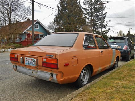 seattles parked cars  datsun