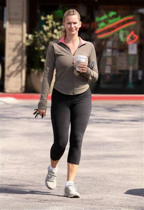 Celebrity Online Today Natasha Henstridge Walking With Coffee