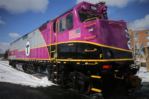 mbta unveils    commuter rail locomotives undergoing facelift