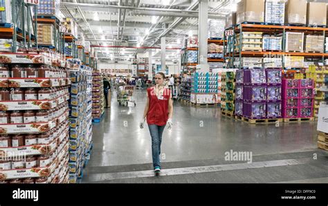 broad main aisle separates lateral aisles  grocery items   stock photo  alamy