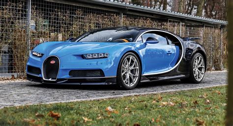 early  tone blue bugatti chiron heading  paris auction car news