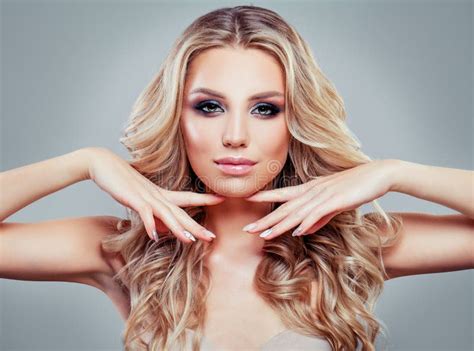 Perfect Blonde Woman Face Model With Long Healthy Curly Hair Stock