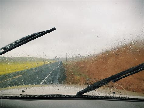 «view Through Car Windshield Of Rainy And Stormy Road Del Colaborador