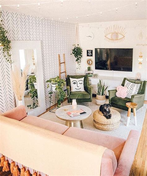 blush pink  greenery filled minimal boho living room interior
