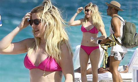ellie goulding in hot pink bikini while enjoying a beach day with male companion daily mail online