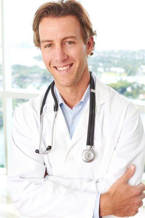 close    happy young doctor smiling stock image image