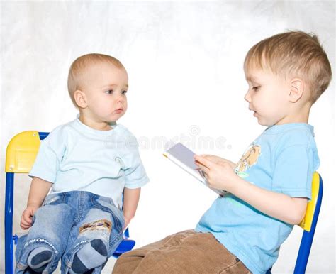 reading kids stock image image  couple play expression