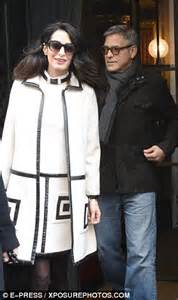 pregnant amal clooney and george leave their paris hotel