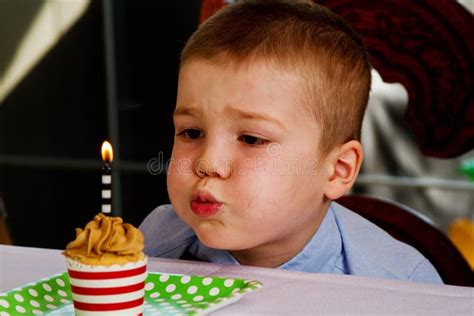 child blowing  candle stock image image  birthday