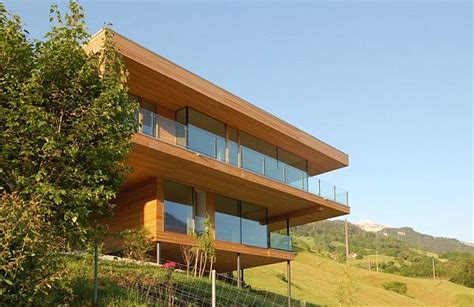 Two Story Contemporary Home Made Out From Concrete Wood