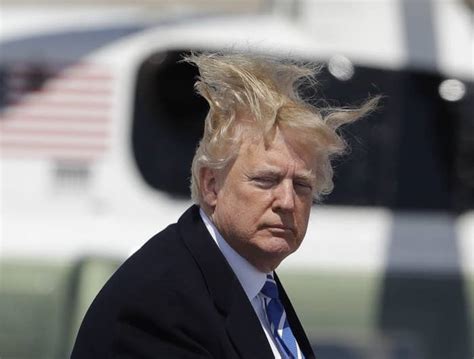 trump boarding air force     windy day