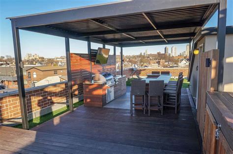 rooftop deck  outdoor kitchen  tv denver roof decks