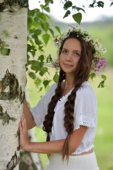 Sweet Russian Girl Girl In A White Birch In The Summer With A Wreath