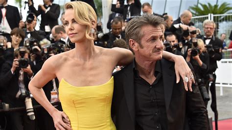 charlize theron and sean penn are a couple no more it