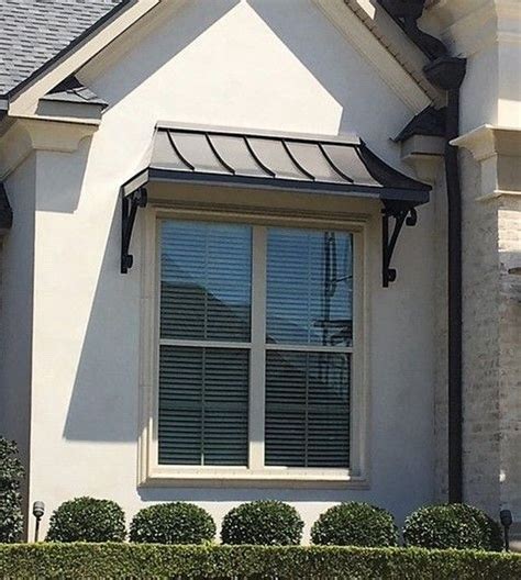 atawningdesign posted  instagram  bronze juliet awning   lazy scrolls house