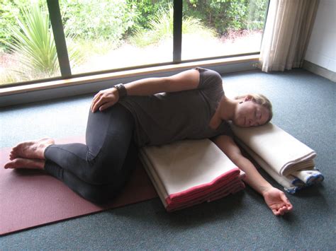 restorative yoga supported sidelying posture restorative yoga
