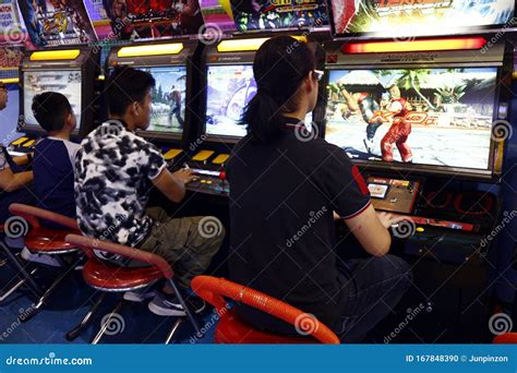 customers play video games   attractions   game arcade