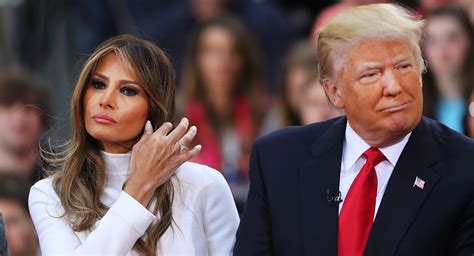 donald trump tries to hold hands with melania gets shut