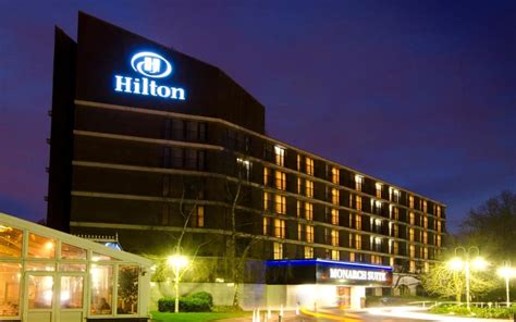 hilton plans  open   hotels   uk
